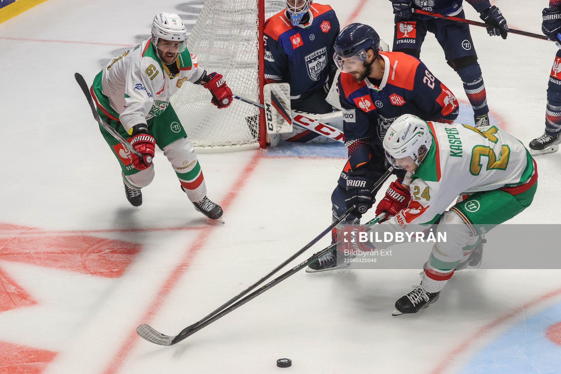 Marco Kasper and Ludwig Larsson of Rögle against Daniel