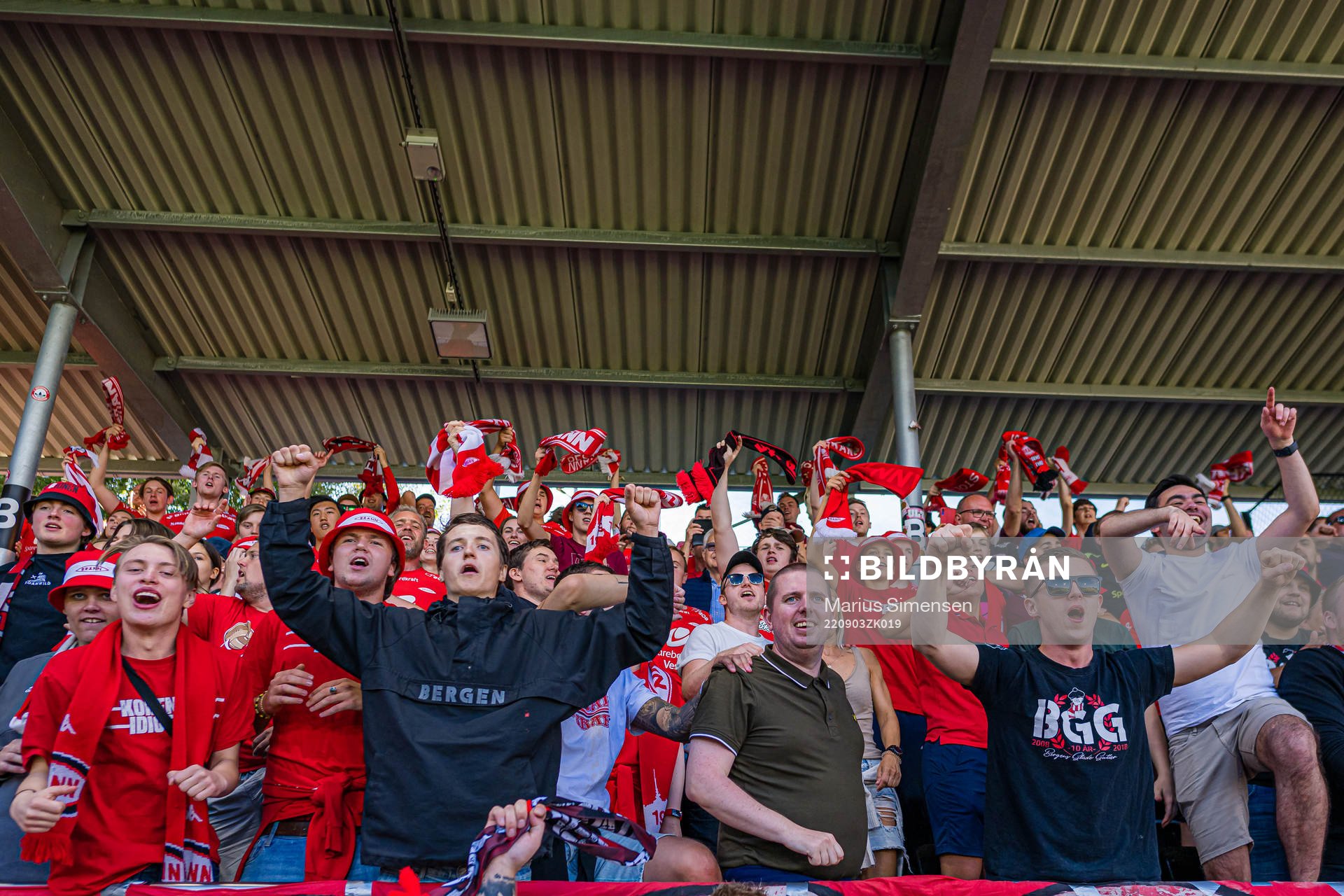 Spectators in the stands celebrates