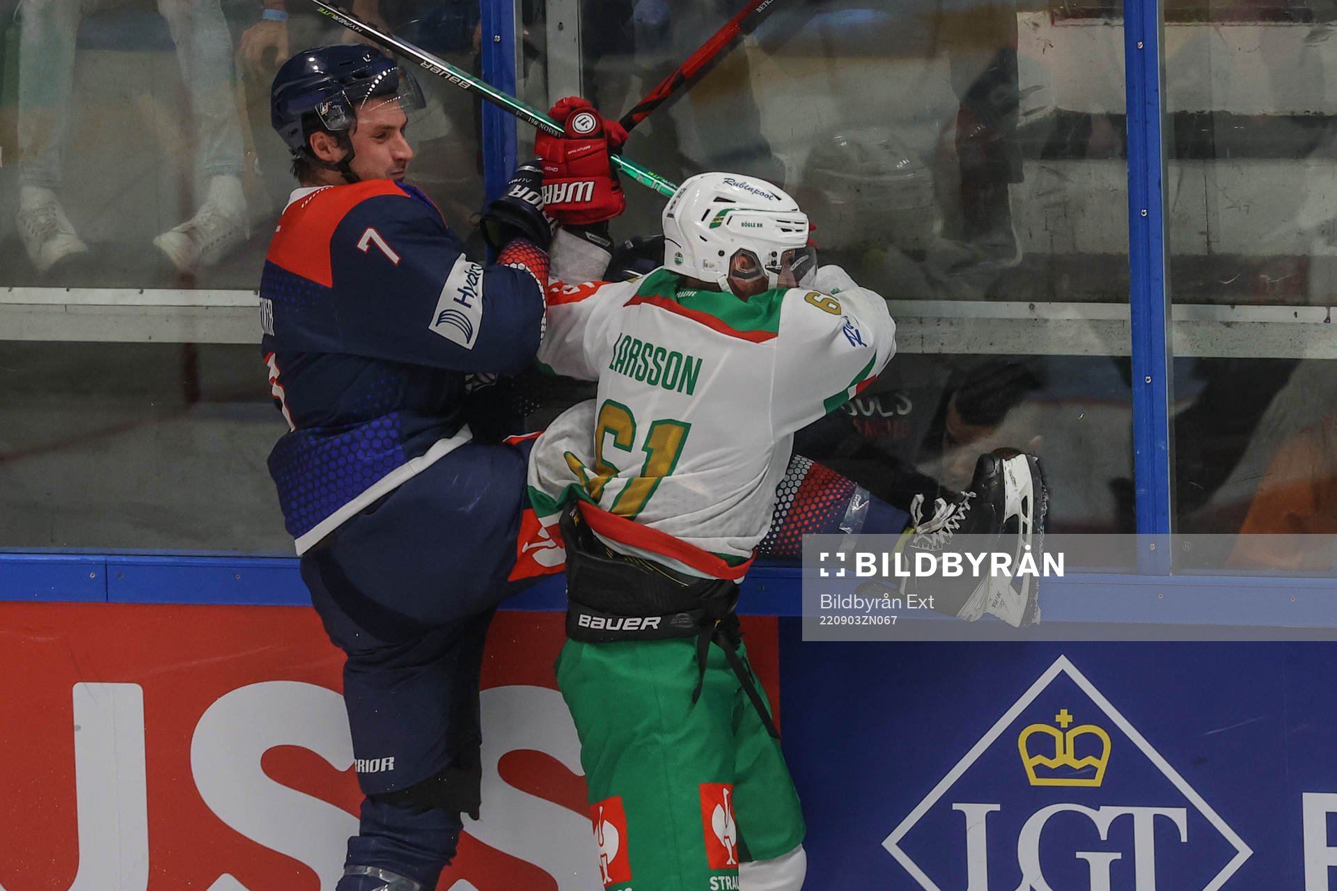 Ben Betker of Fehervar and Ludvig Larsson of Rögle