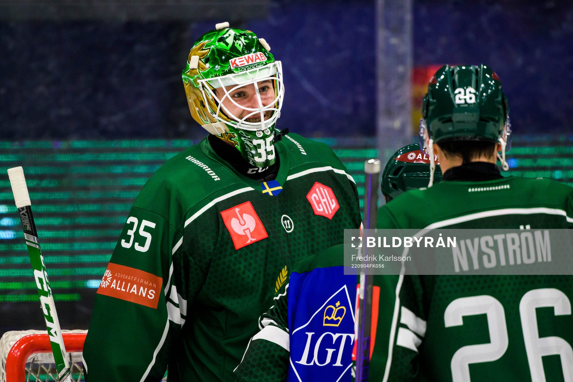 Färjestad goaltender Dennis Hildeby celebrates with
