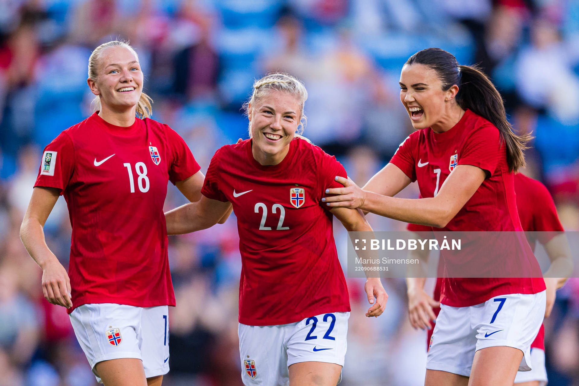 Sophie Roman Haug of Norway (middle) celebrates with Frida