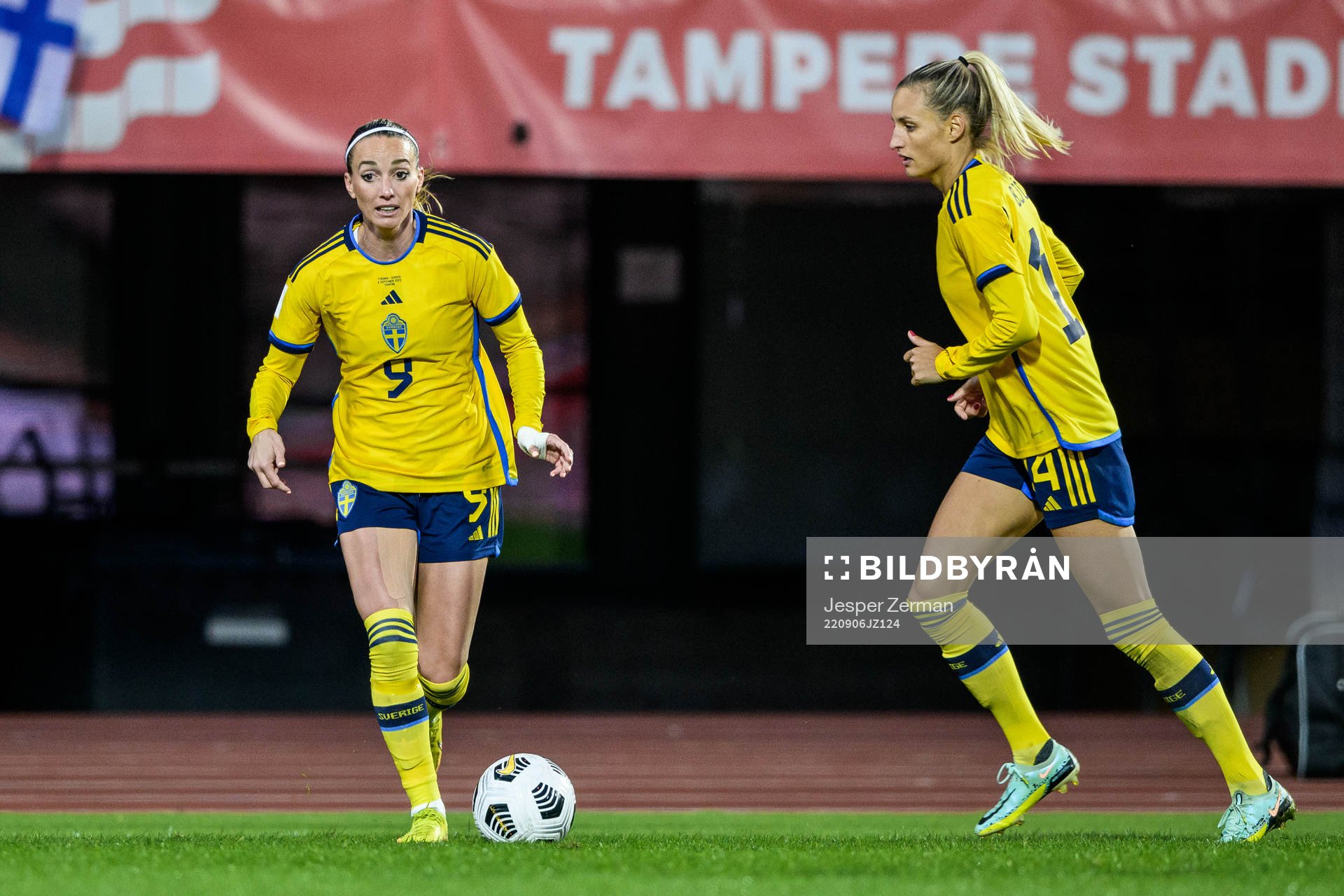 Kosovare Asllani and Nathalie Björn of Sweden