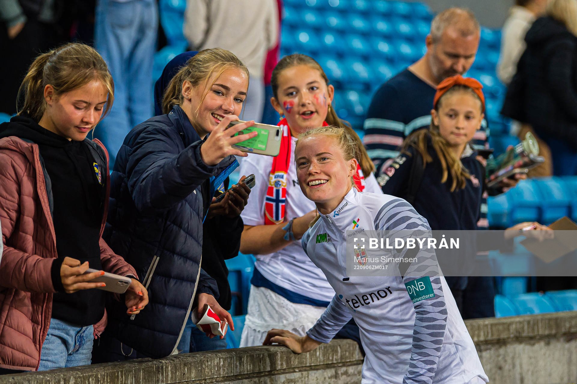 Julie Blakstad of Norway taking a selfie ith a fan