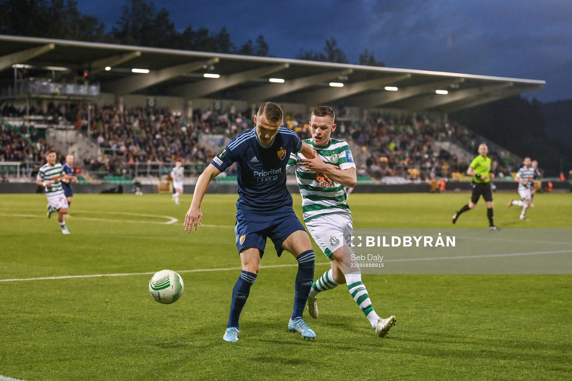 Piotr Johansson of Djurgården and Andrew Lyons of Shamrock Rovers during the UEFA Conference League group match between Shamrock Rovers and Djurgården on September 8, 2022 in Dublin.