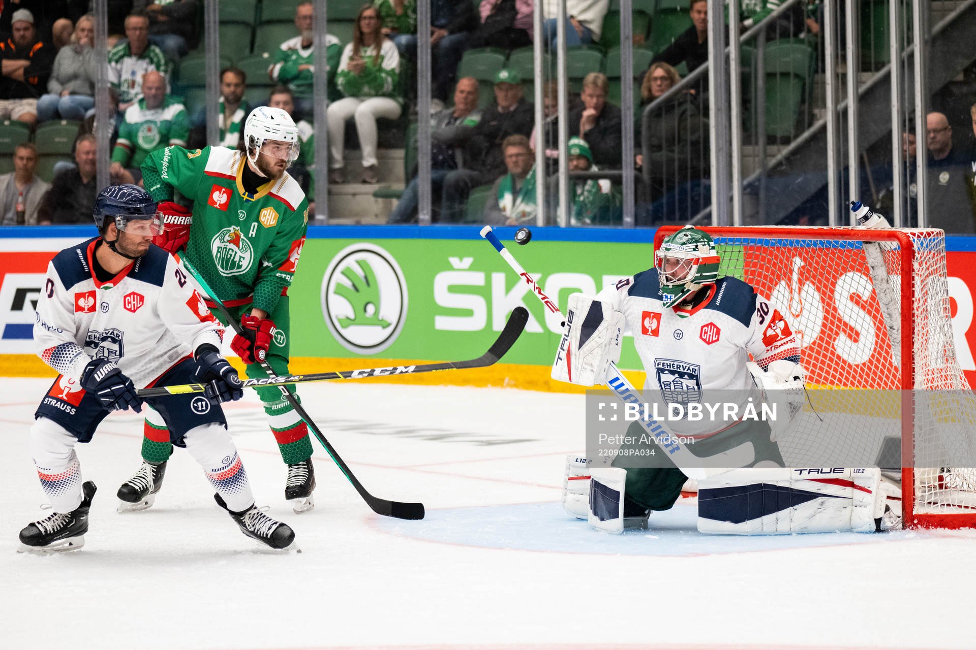 Dennis Everberg of Rögle against goalkeeper Olivier Roy