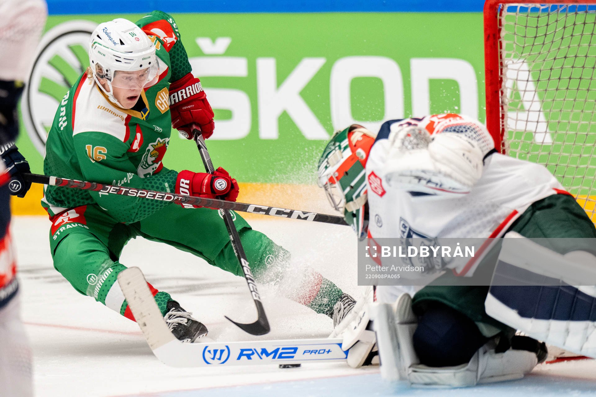 Theodor Niederbach of Rögle against goalkeeper Olivier Roy