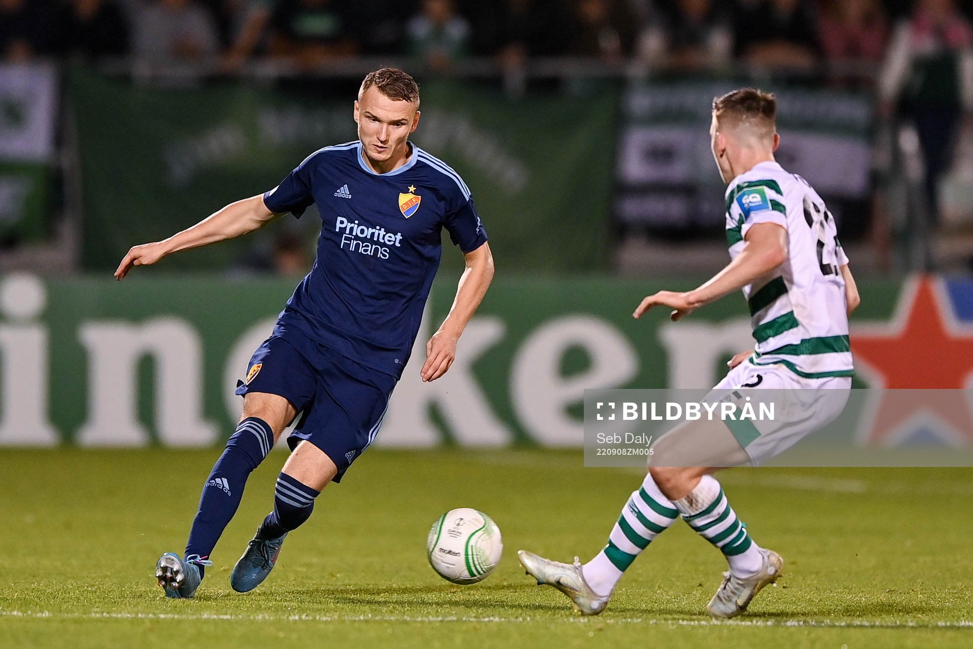 Piotr Johansson of Djurgården and Andrew Lyons of Shamrock Rovers during the UEFA Conference League group match between Shamrock Rovers and Djurgården on September 8, 2022 in Dublin.