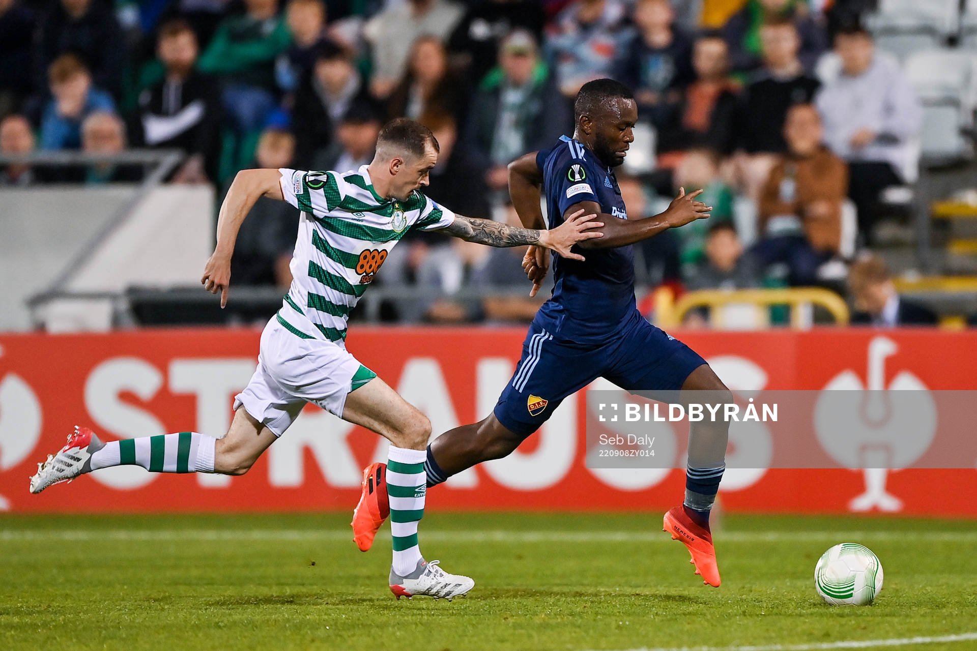 Sean Kavanagh of Shamrock Rovers and Emmanuel Justine Rabby