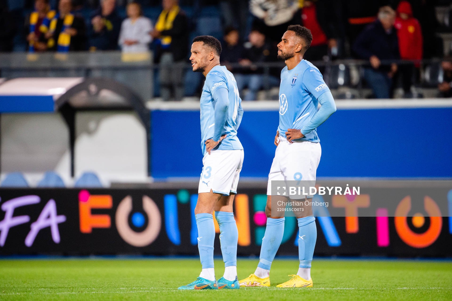 Martin Olsson and Isaac Kiese Thelin of Malmö looks