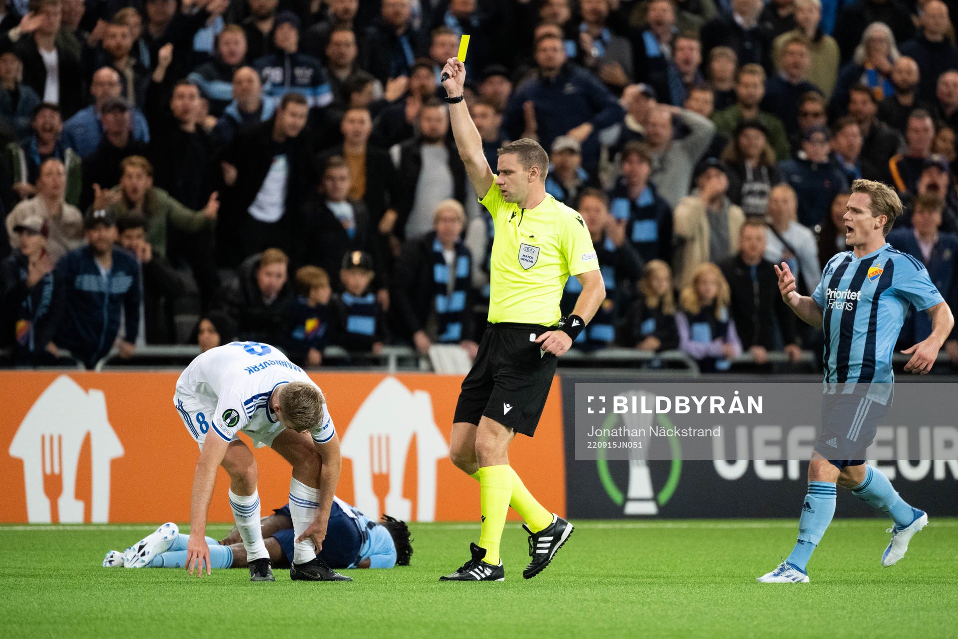 Sivert Mannsverk of Molde is shown a yellow card