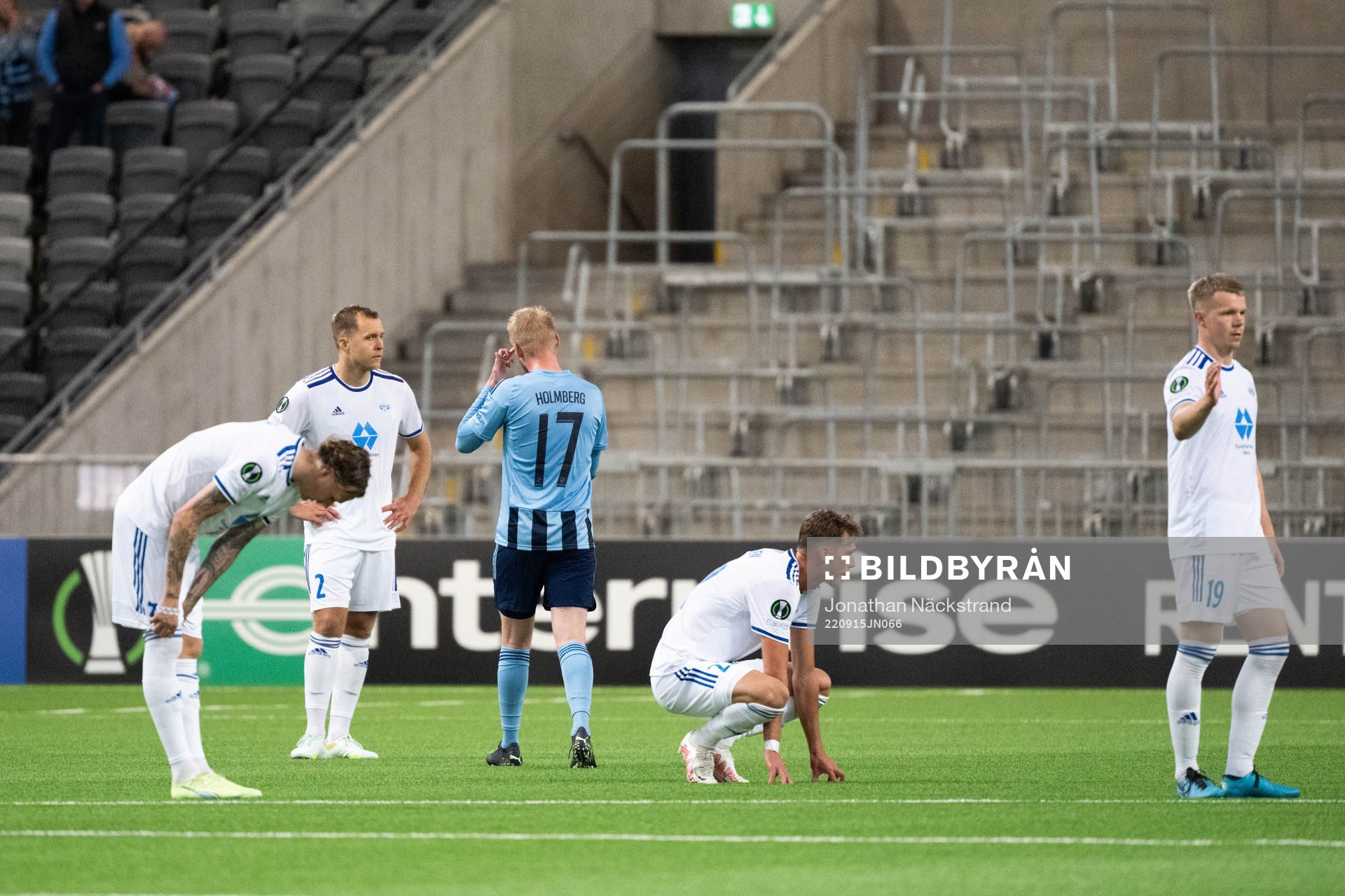 Players of Molde look dejected
