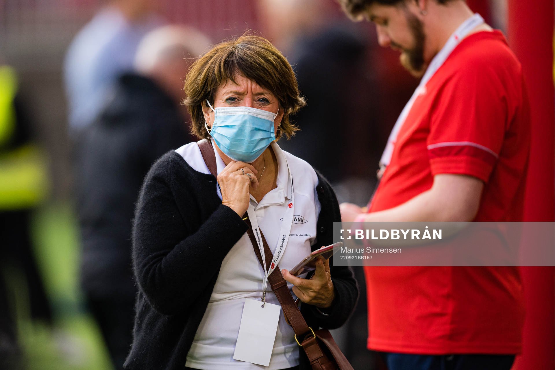 Mette Hammersland, of Brann, wearing a face mask