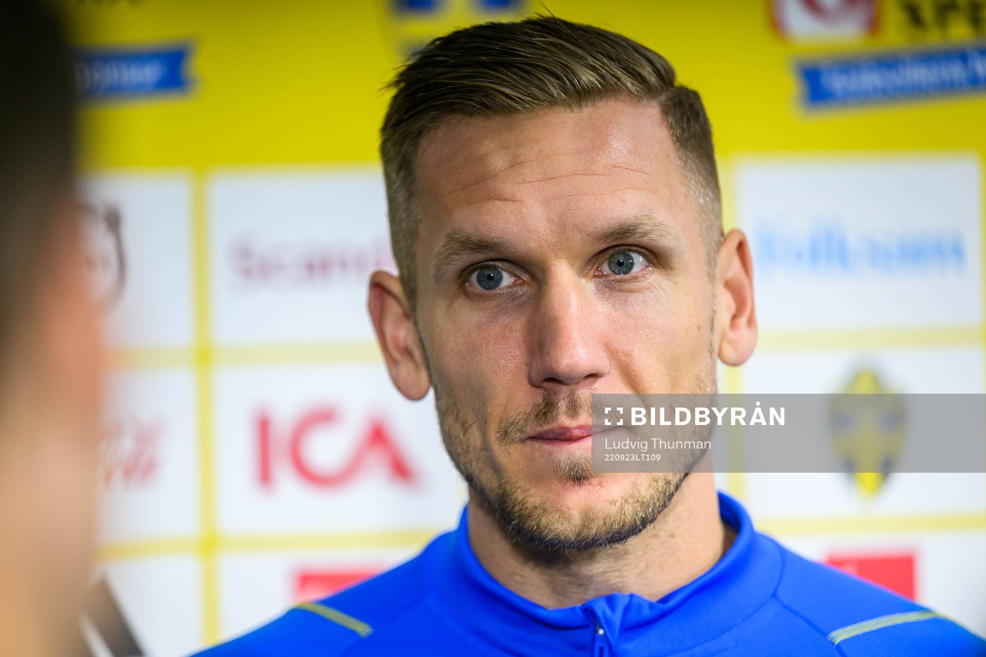 goalkeeper Robin Olsen is being interviewed by media