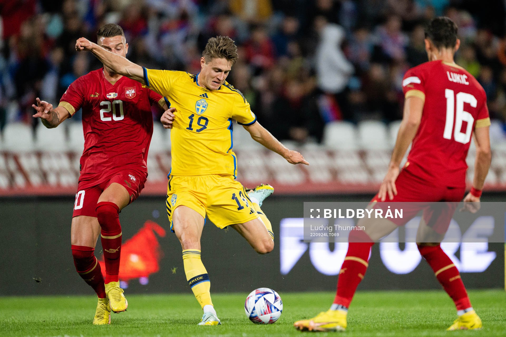 Sergej Milinkovic-Savic of Serbia and Mattias Svanberg of