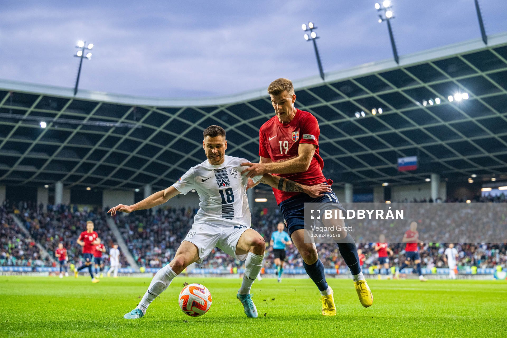 Gregor Sikosek of Slovenia and Alexander Sørloth of Norway during the Nations League football match between Slovenia and Norway on September 24, 2022 in Ljubljana. 