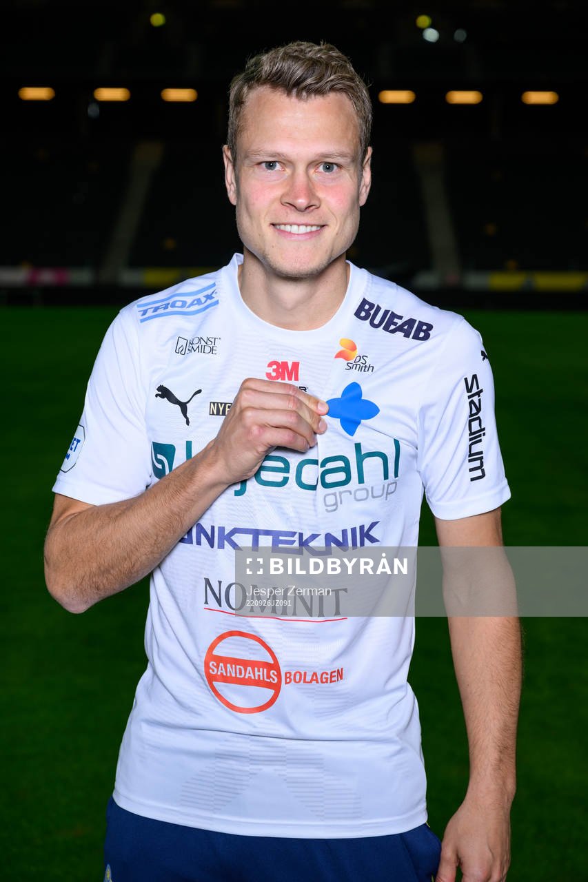 Viktor Claesson poses for a portrait with the jersey of his