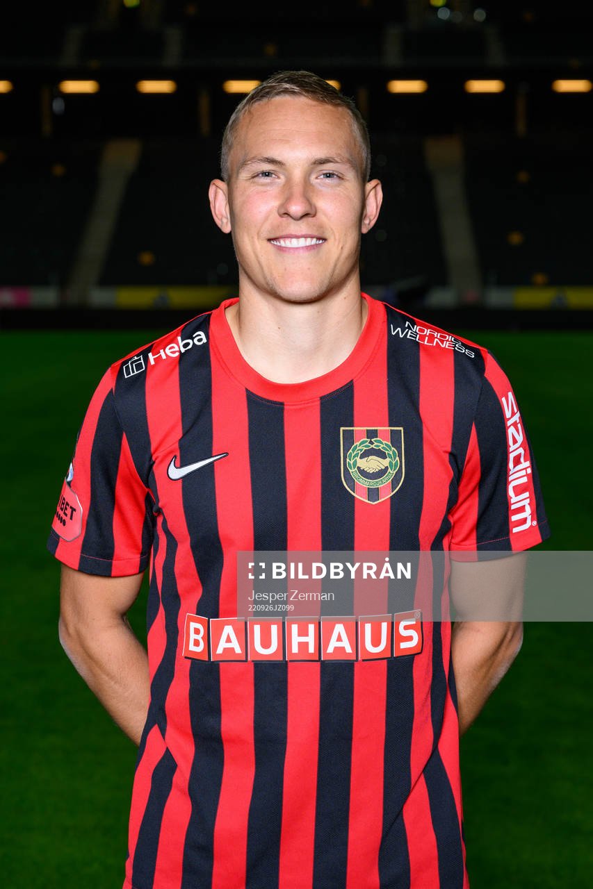 Ludwig Augustinsson poses for a portrait with the jersey of