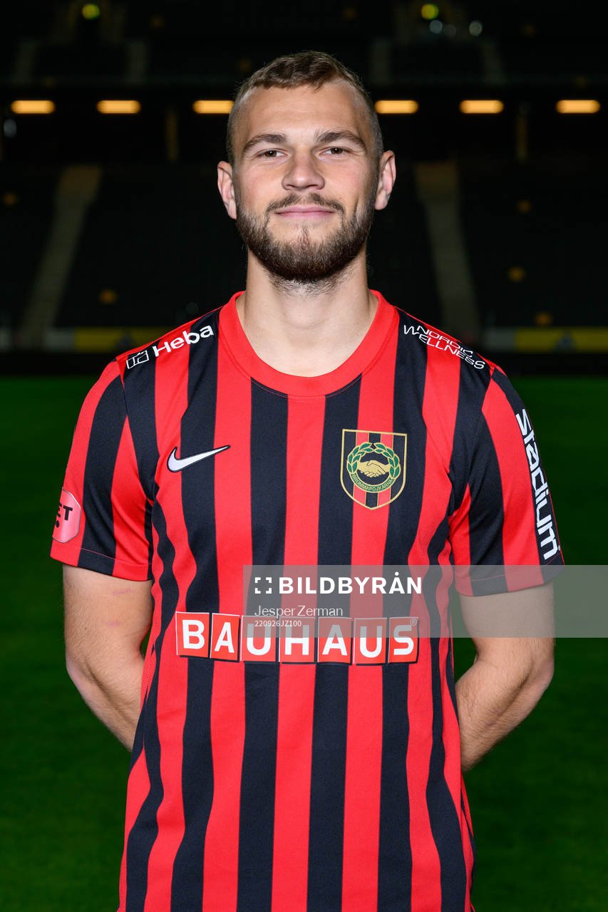 Jesper Karlström poses for a portrait with the jersey of