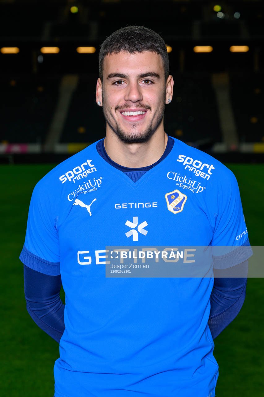 Edvin Kurtulus poses for a portrait with the jersey of his