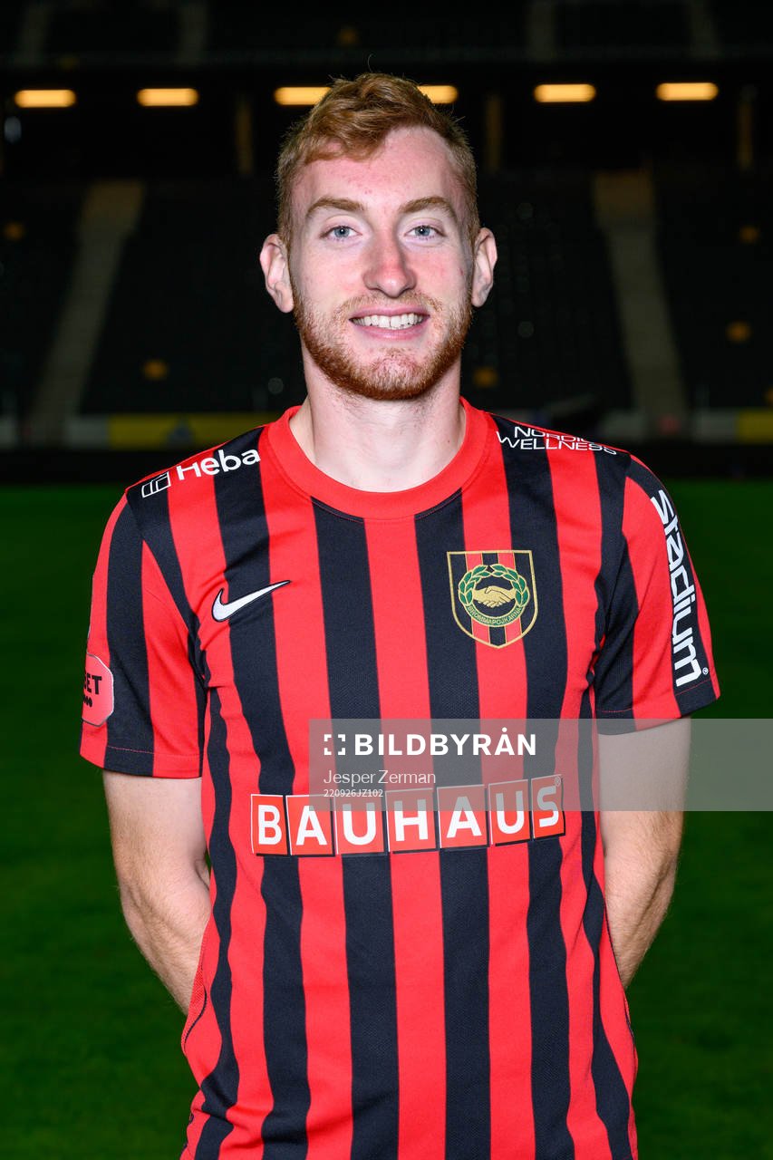 Dejan Kulusevski poses for a portrait with the jersey of