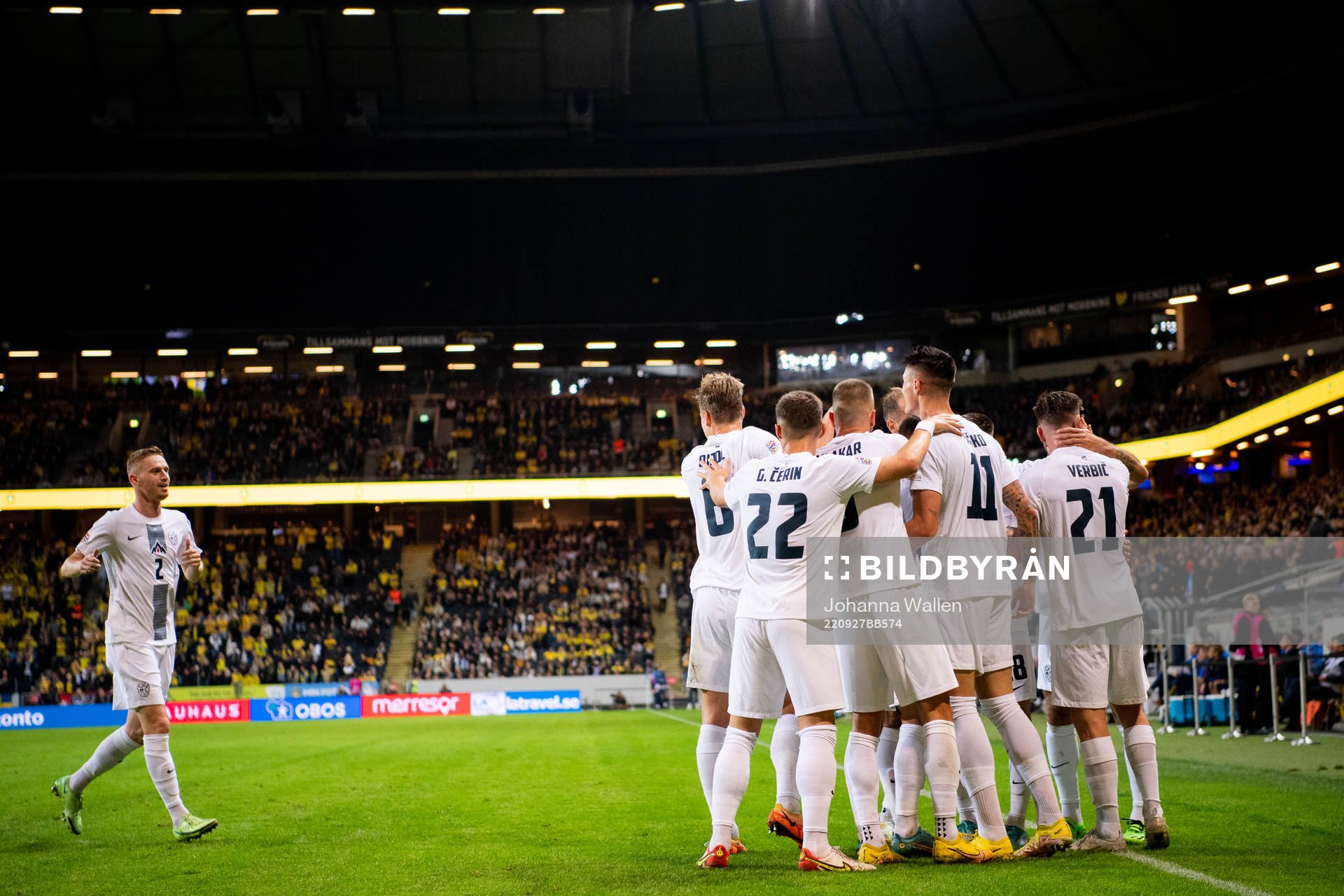 Benjamin Verbic of Slovenia celebrate with team mates