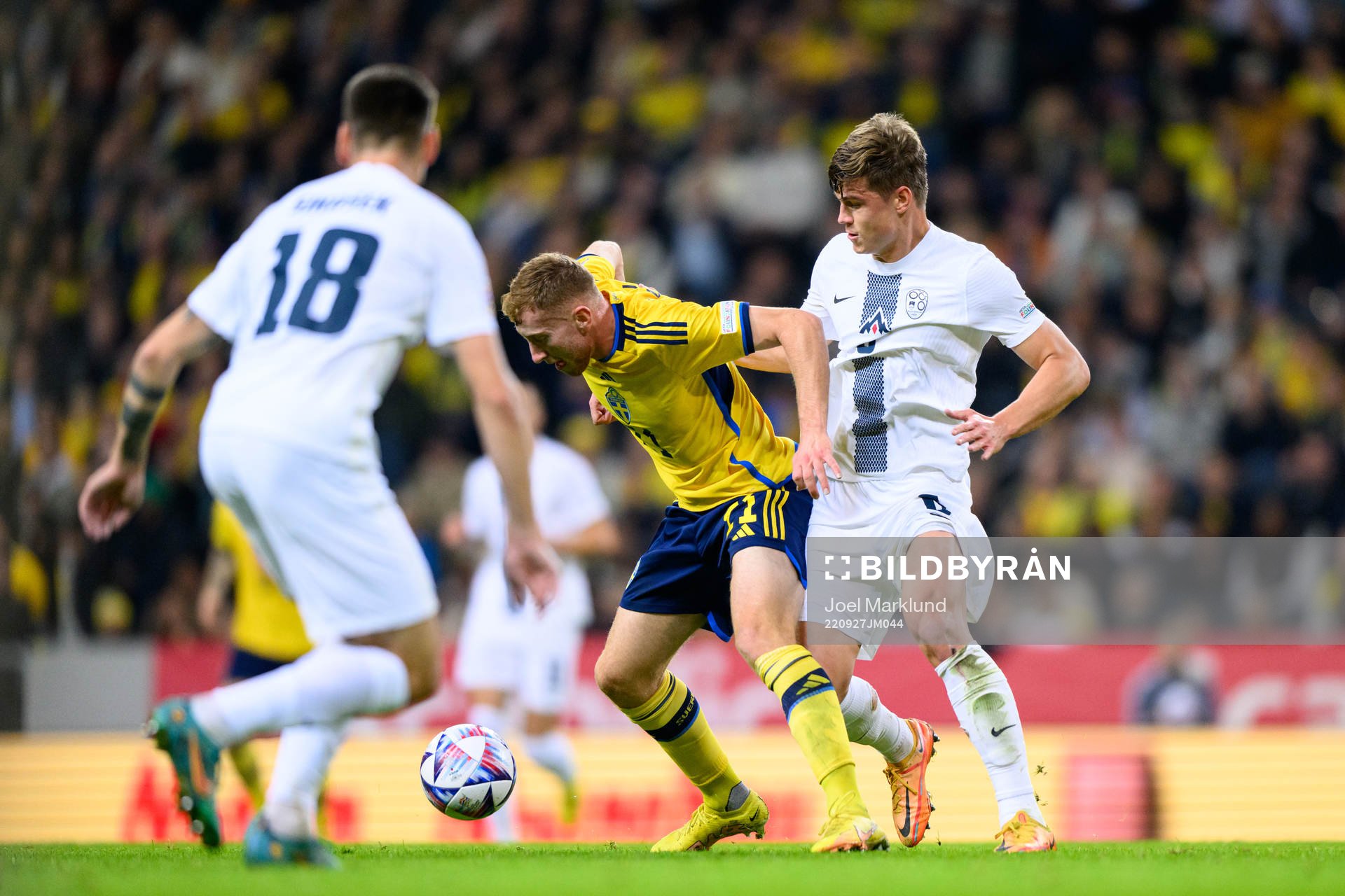 Dejan Kulusevski of Sweden and Jaka Bijol of Slovenia