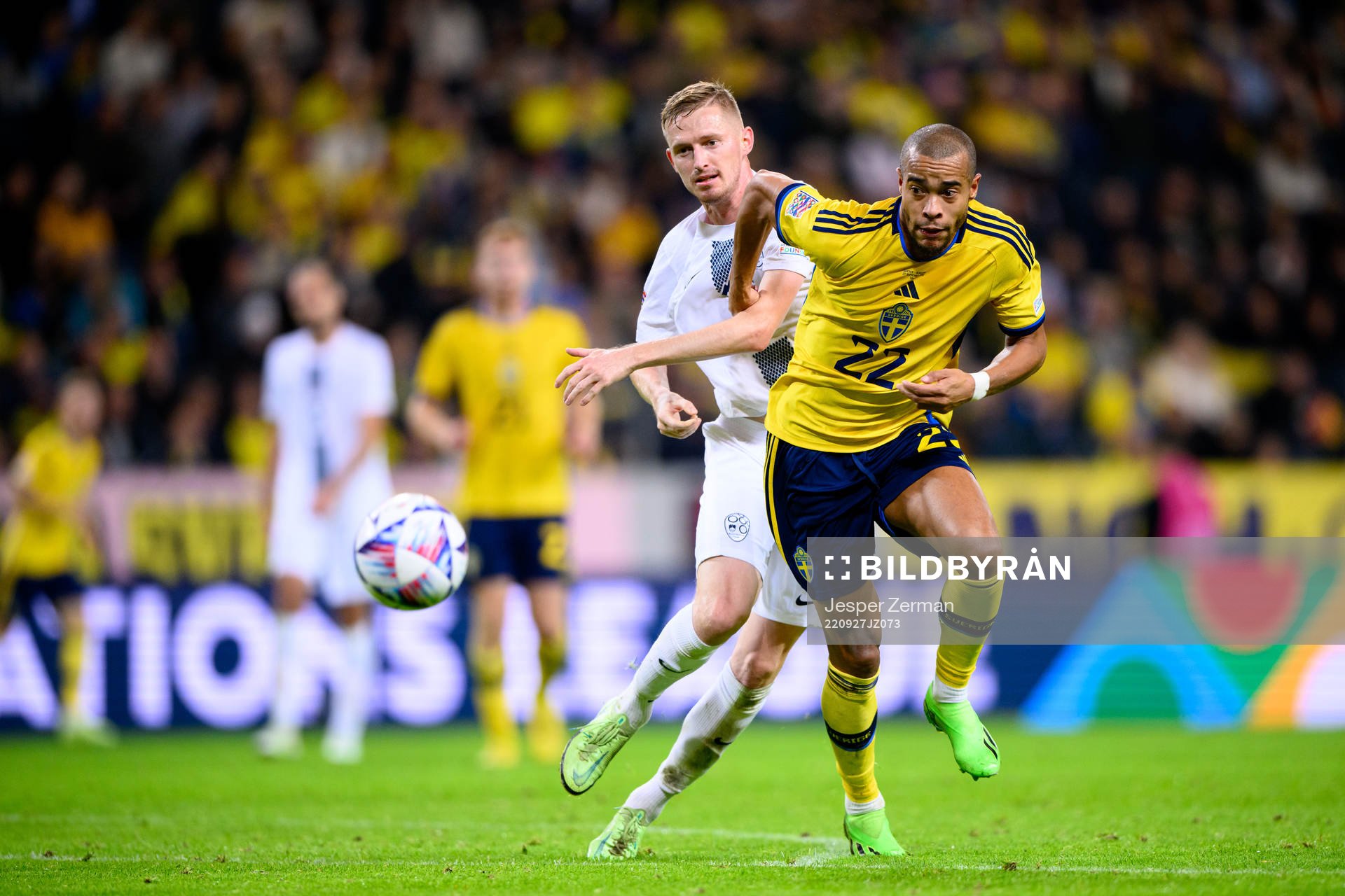 Zan Karnicnik of Slovenia and Robin Quaison of Sweden during the Nations League football match between Sweden and Slovenia on September 27, 2022 in Stockholm.