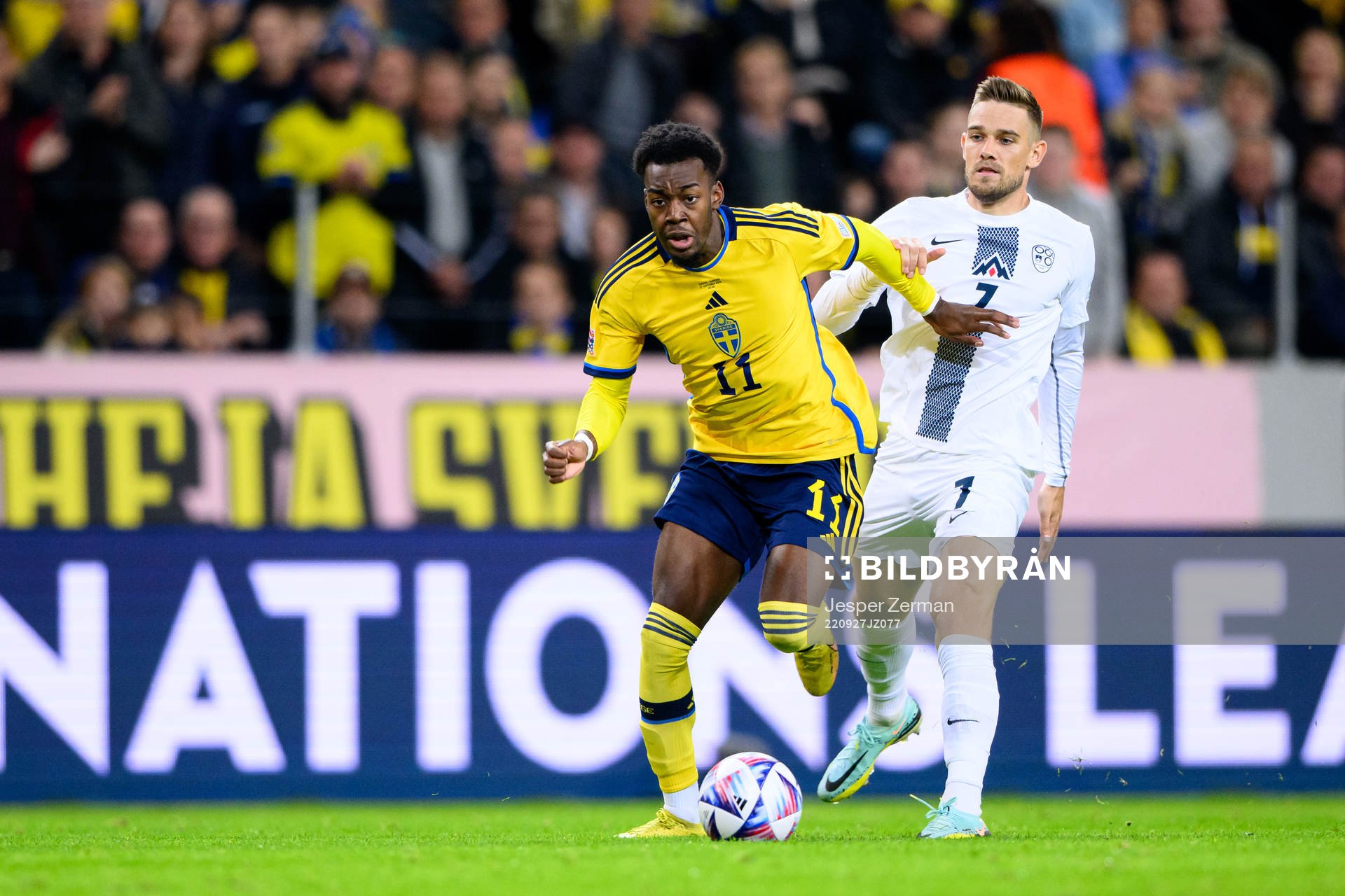 Anthony Elanga of Sweden and Timi Elsnik of Slovenia