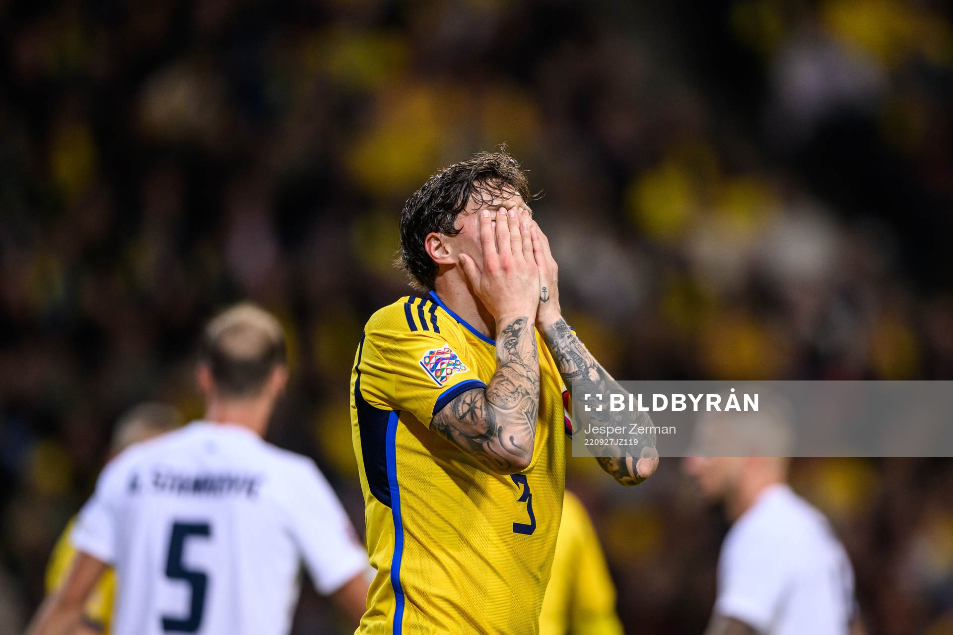 Victor Nilsson Lindelöf of Sweden looks dejected