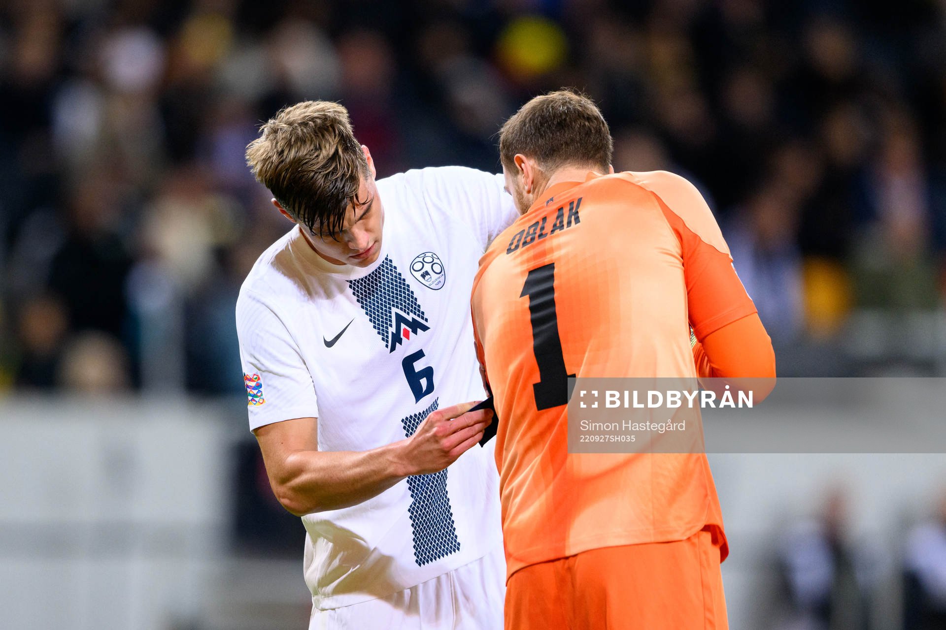 Jaka Bijol and goalkeeper Jan Oblak of Slovenia during the Nations League football match between Sweden and Slovenia on September 27, 2022 in Stockholm.