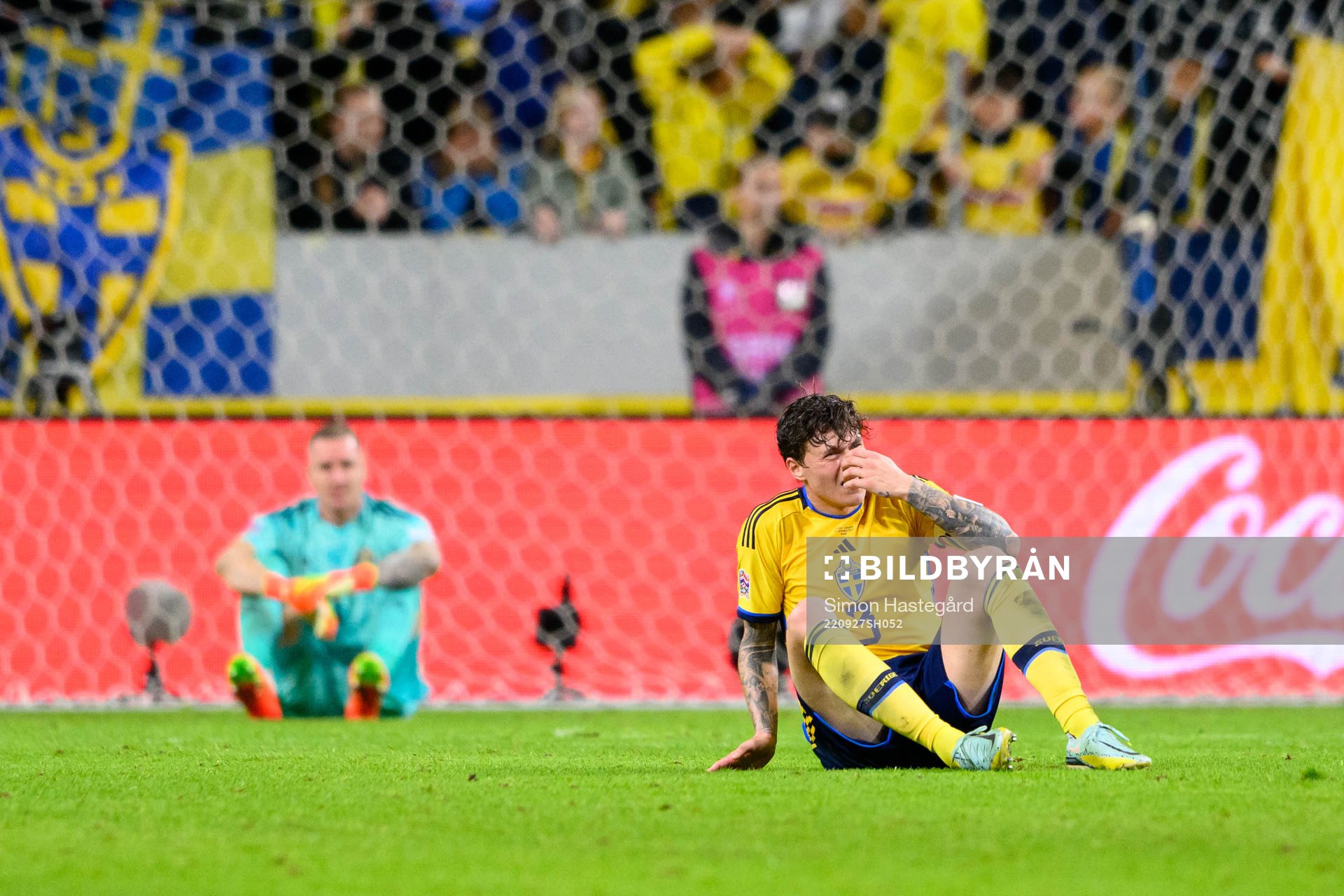 Victor Nilsson Lindelöf of Sweden looks dejected
