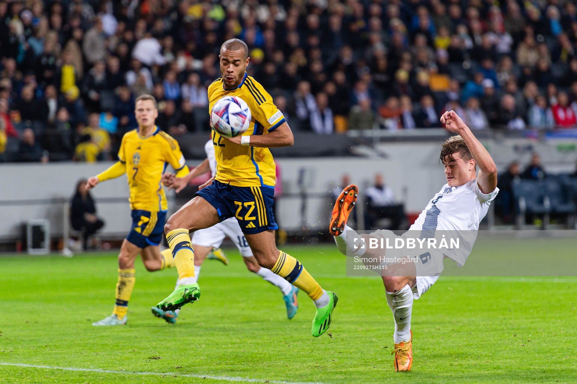 Robin Quaison of Sweden and Jaka Bijol of Slovenia
