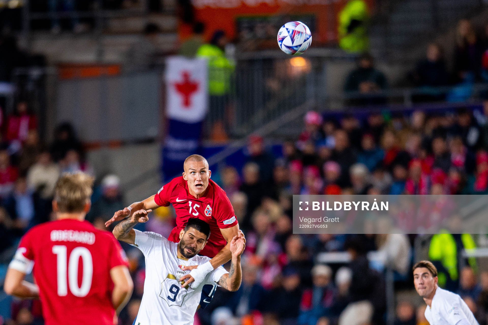 Aleksandar Mitrovic of Serbia and Leo Skiri Østigård of