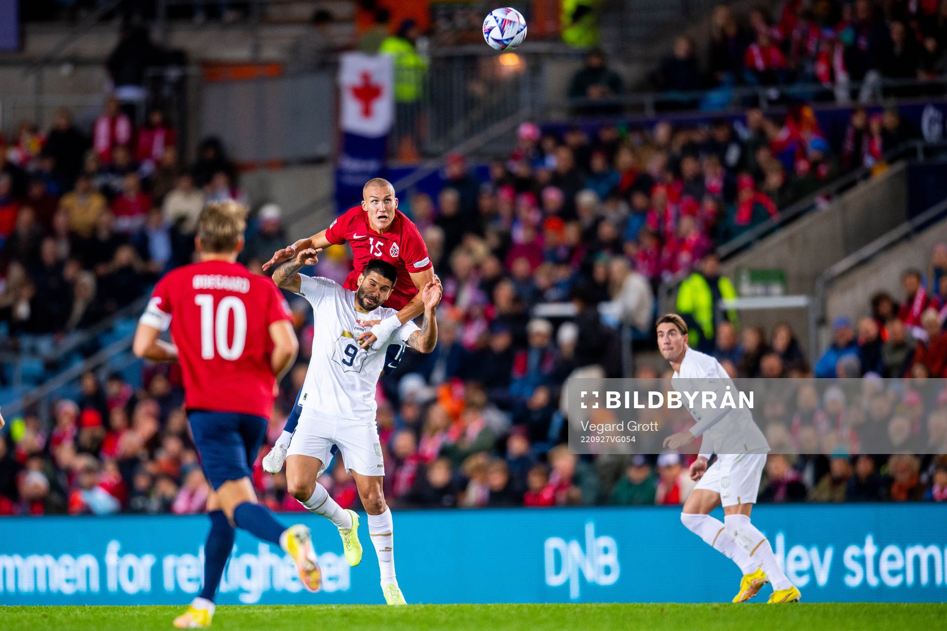 Aleksandar Mitrovic of Serbia and Leo Skiri Østigård of