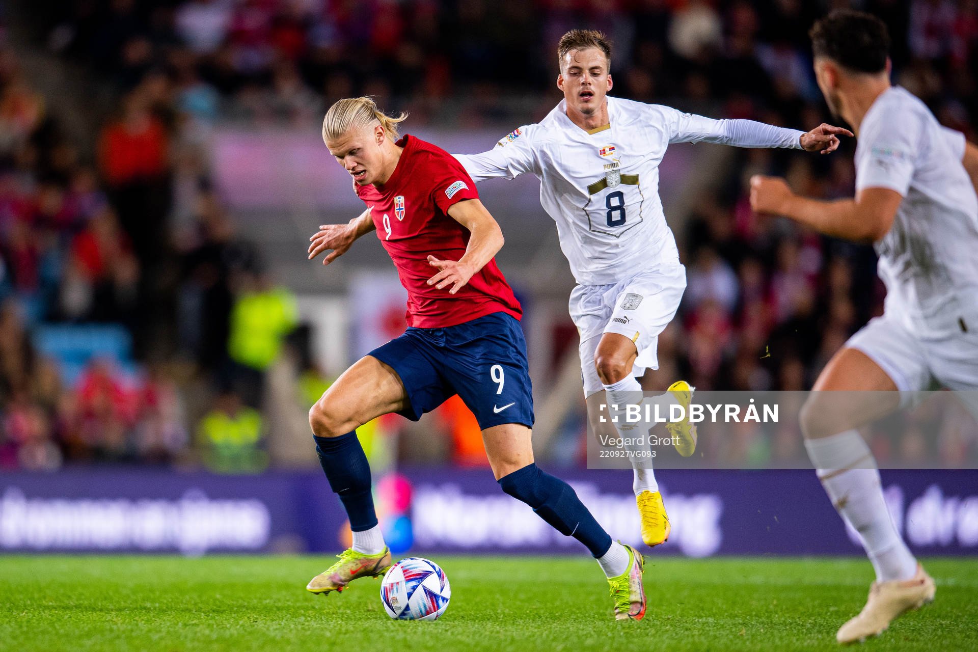 Erling Braut Haaland of Norway and Ivan Ilic of Serbia