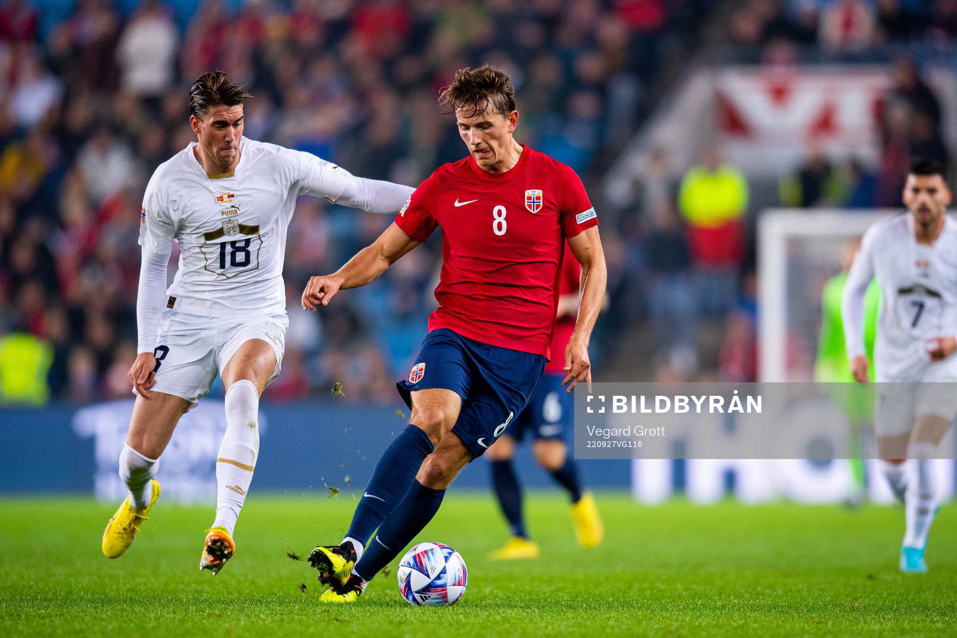 Dusan Vlahovic of Serbia and Sander Berge of Norway
