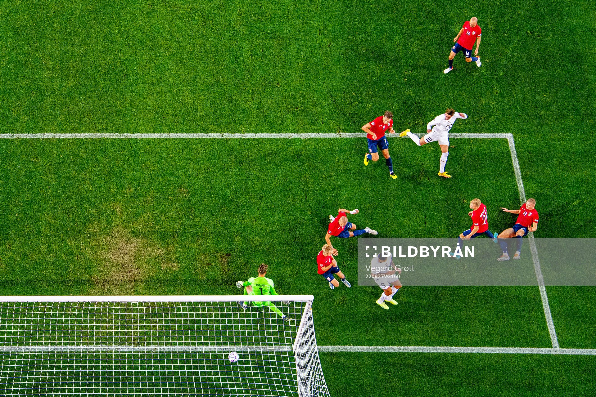 Dusan Vlahovic of Serbia scores 0-1 behind goalkeeper