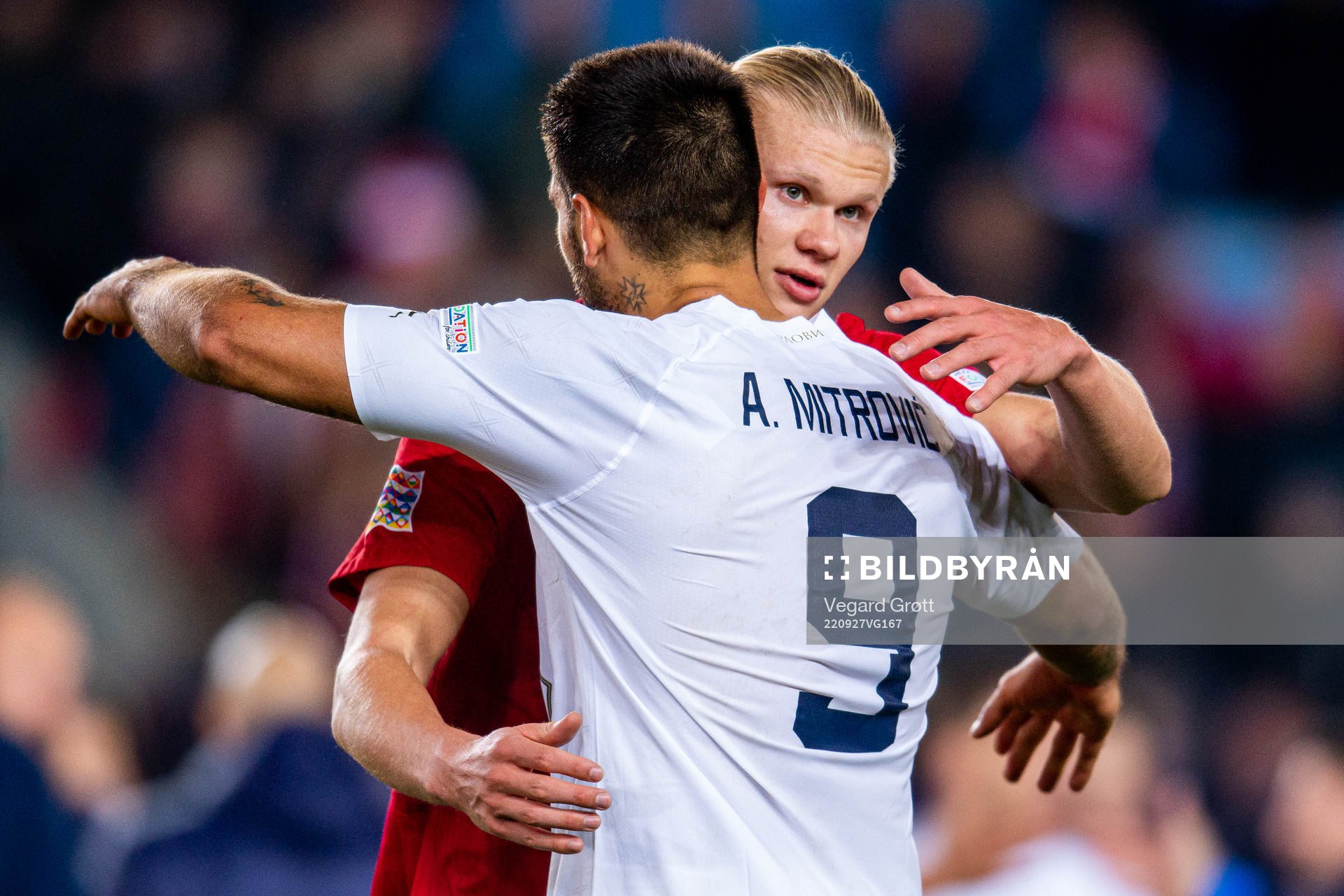 Erling Braut Haaland of Norway and Aleksandar Mitrovic of