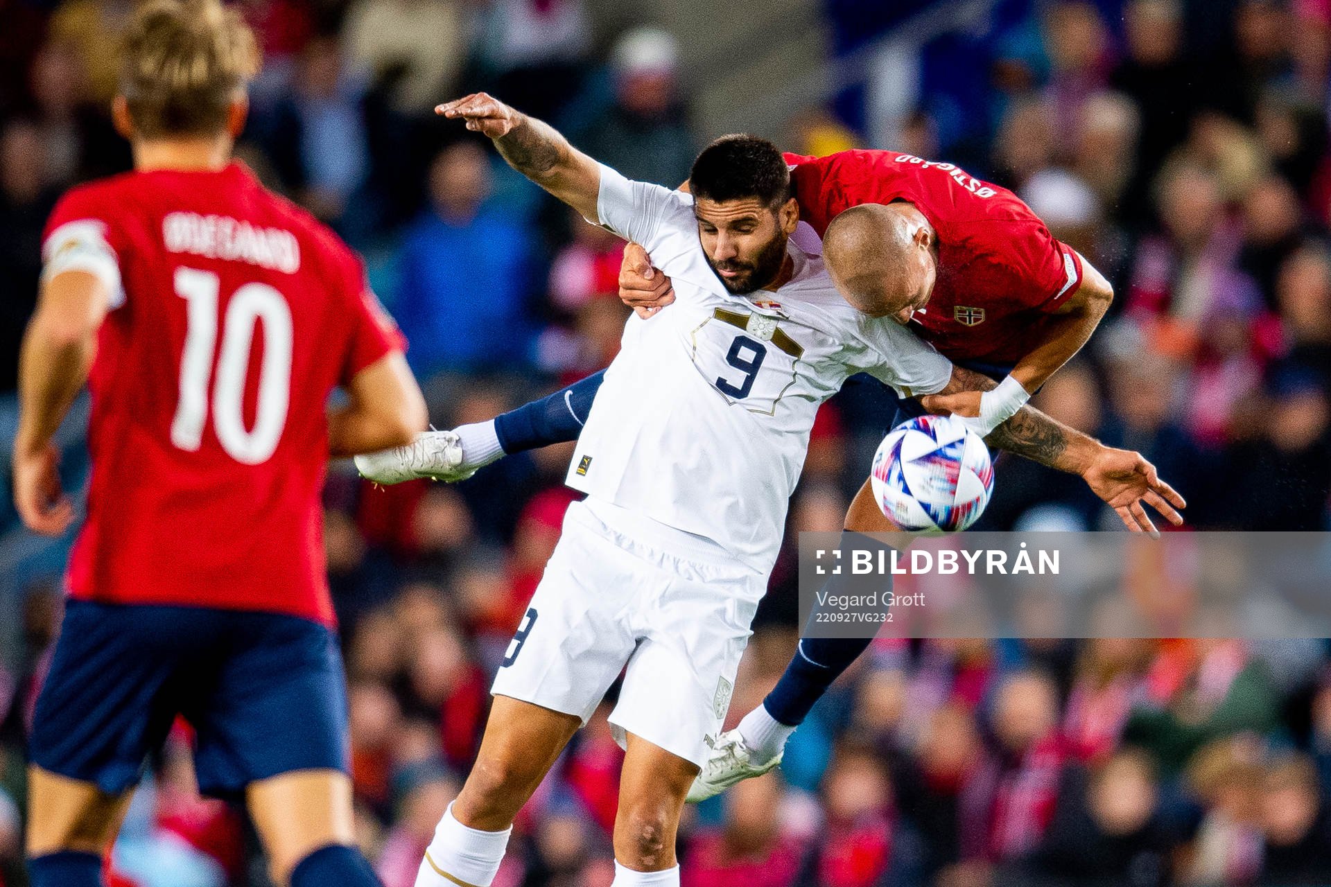 Aleksandar Mitrovic of Serbia and Leo Skiri Østigård of