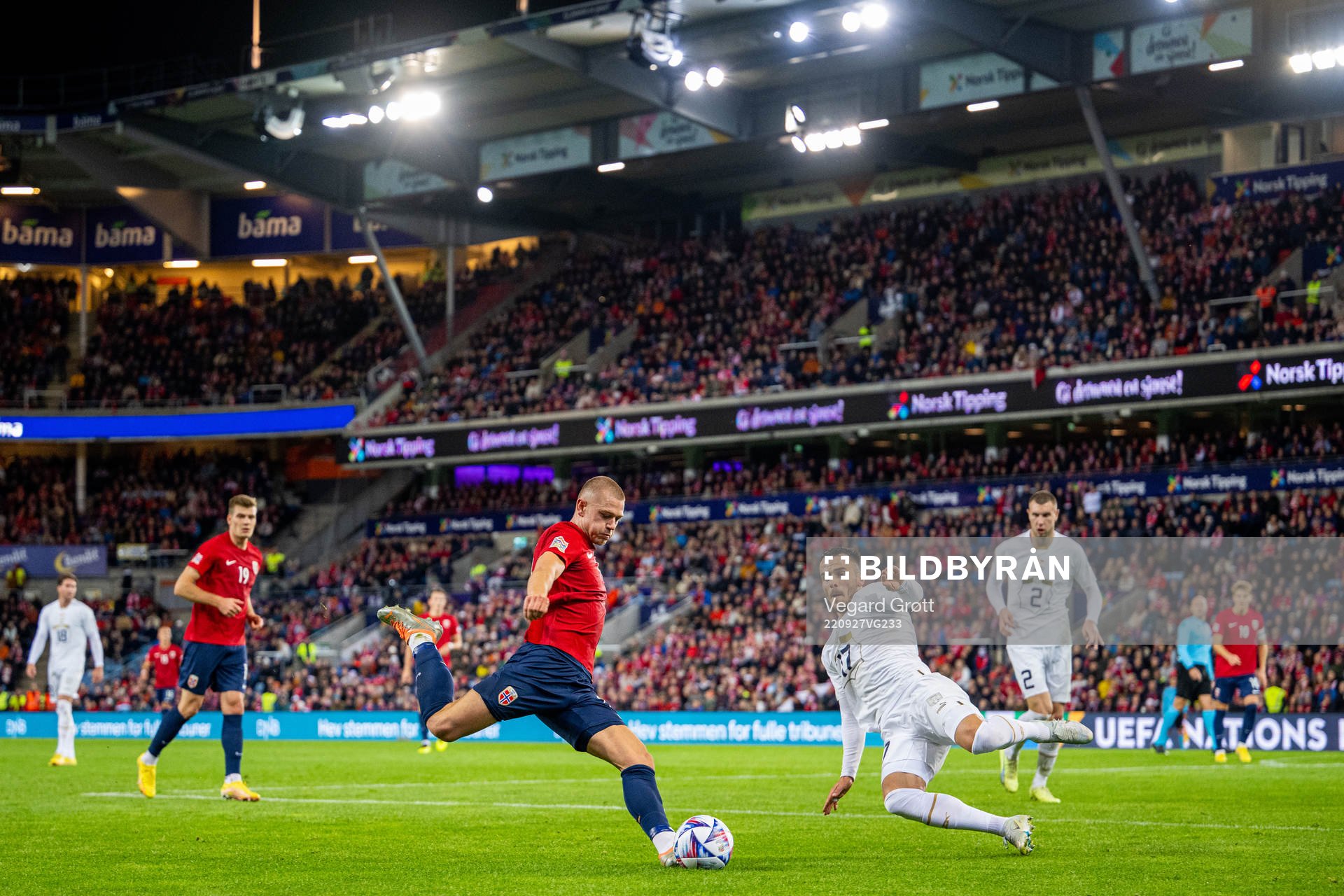 Julian Ryerson of Norway and Filip Kostic of Serbia during the Nations League football match between Norway and Serbia on September 27, 2022 in Oslo.