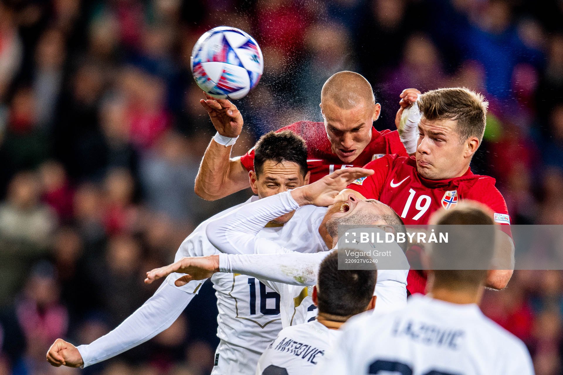 Sasa Lukic of Serbia against Leo Skiri Østigård and