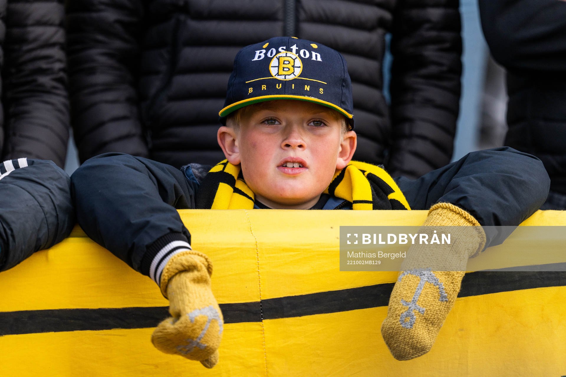 En ung häckensupporter