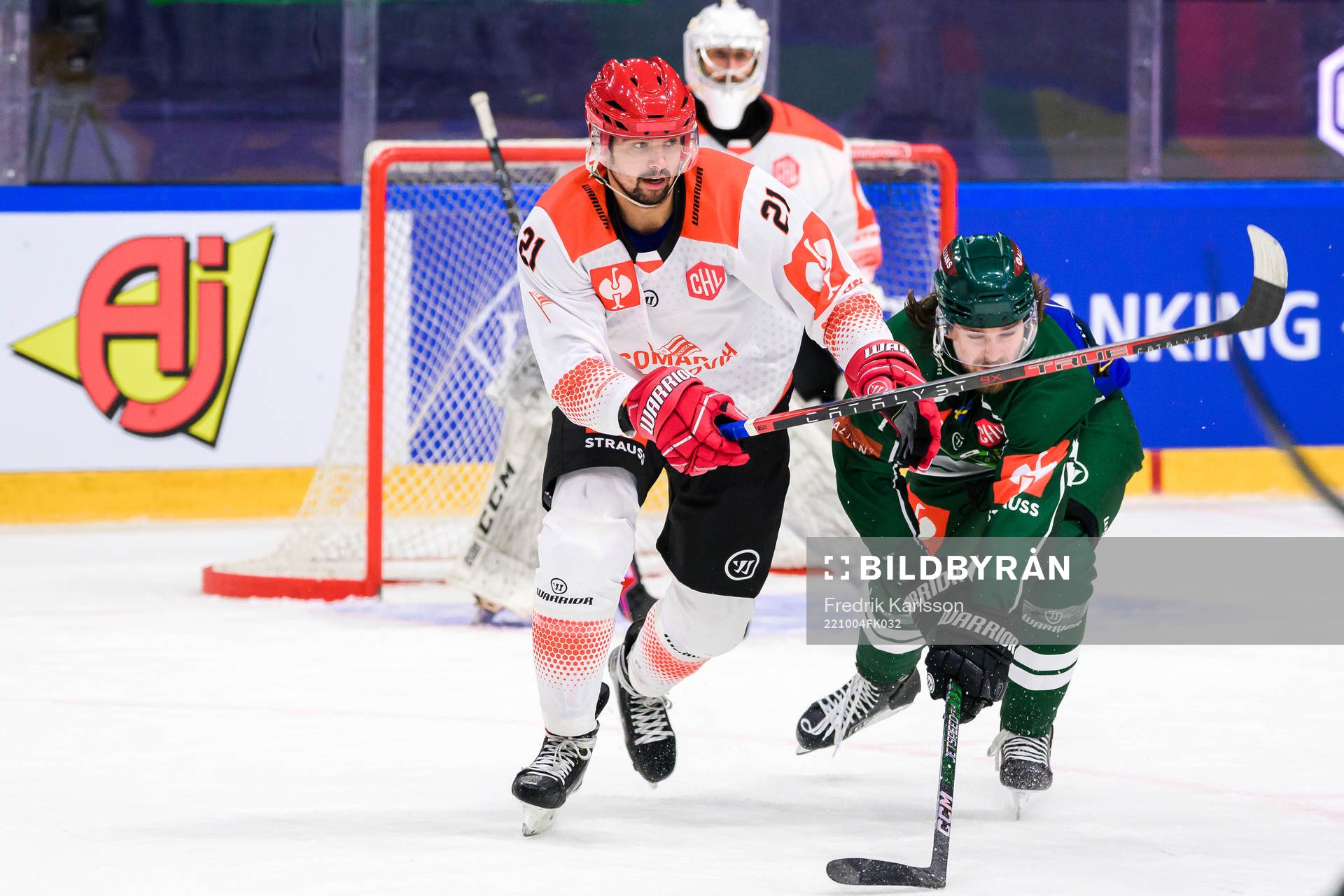 Marek Racuk of Cracovia and Linus Johansson of Färjestad