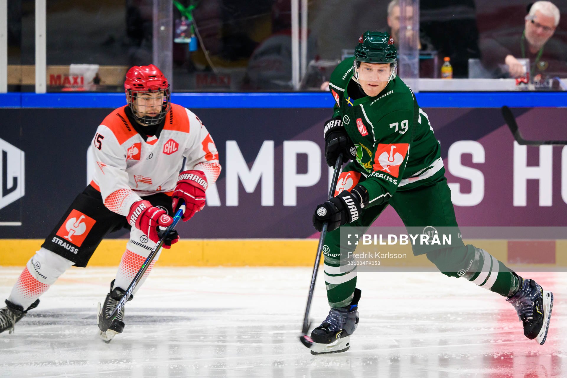 Patryk Wronka of Cracovia and Patrik Lundh of Färjestad