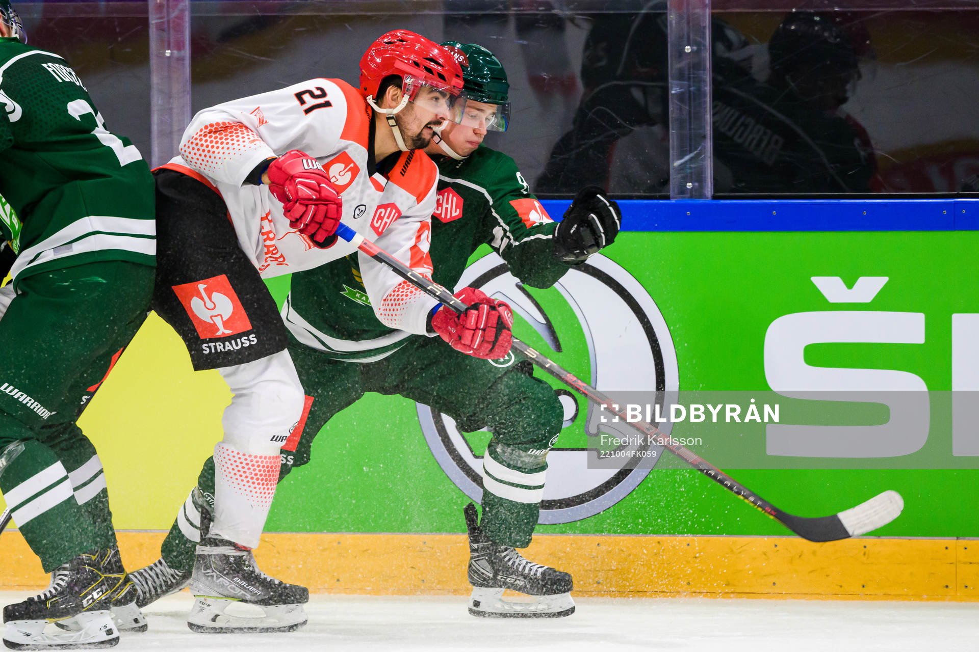 Marek Racuk of Cracovia and Anton Berglund of Färjestad