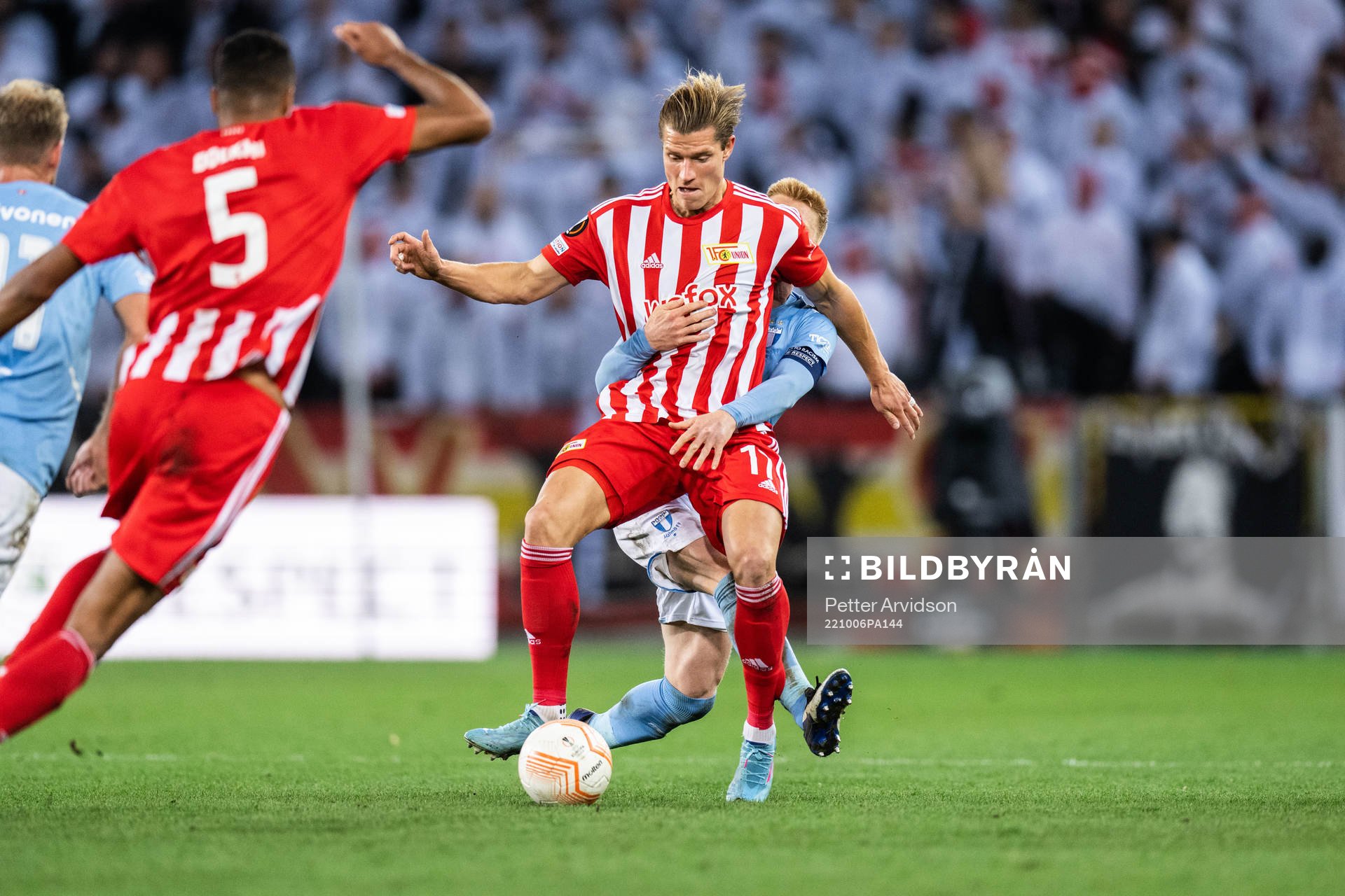 Kevin Behrens of Union Berlin and Anders Christiansen of