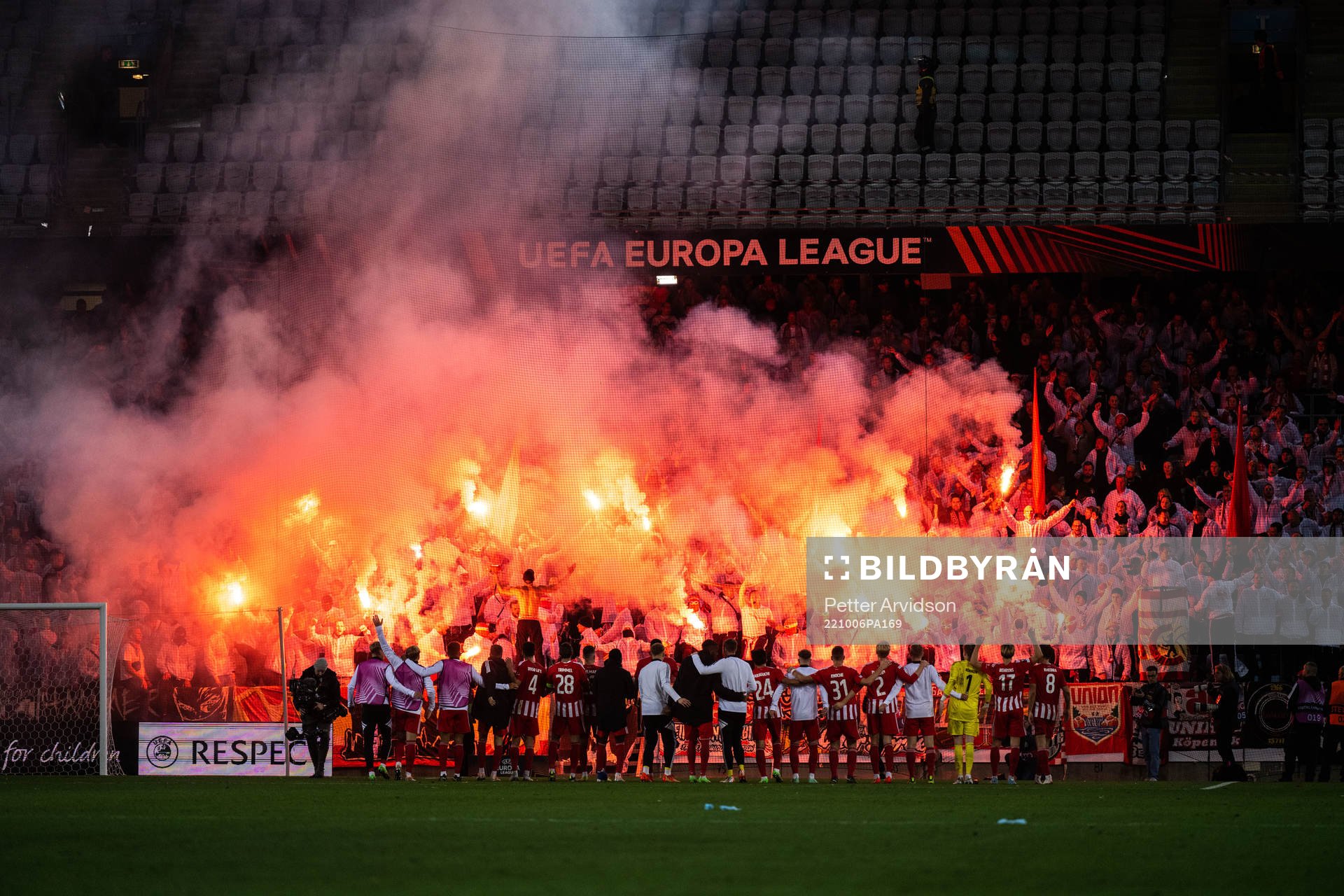 Players of Union Berlin celebrate with supporters