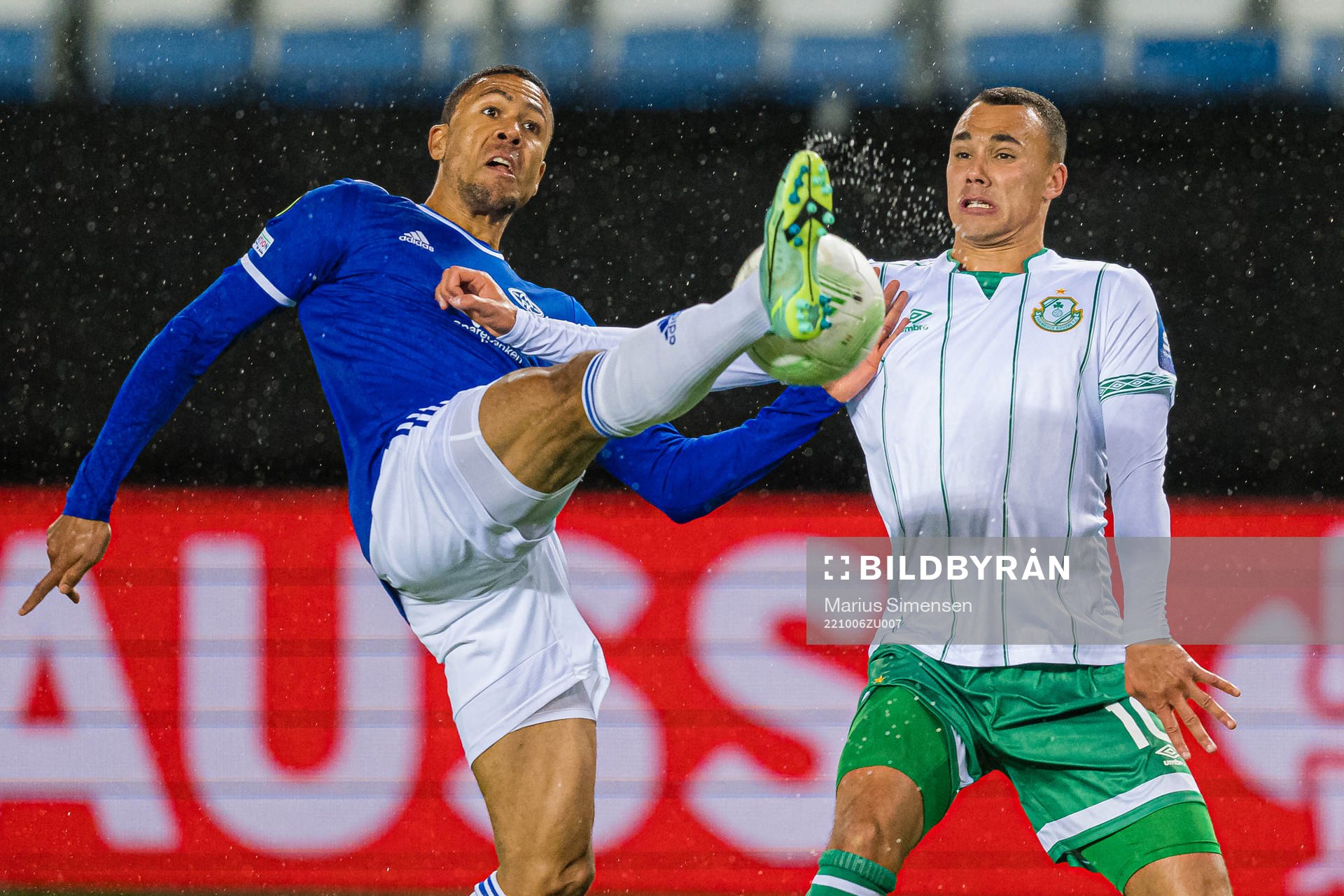 Mathis Bolly of Molde and Graham Burke of Shamrock Rovers