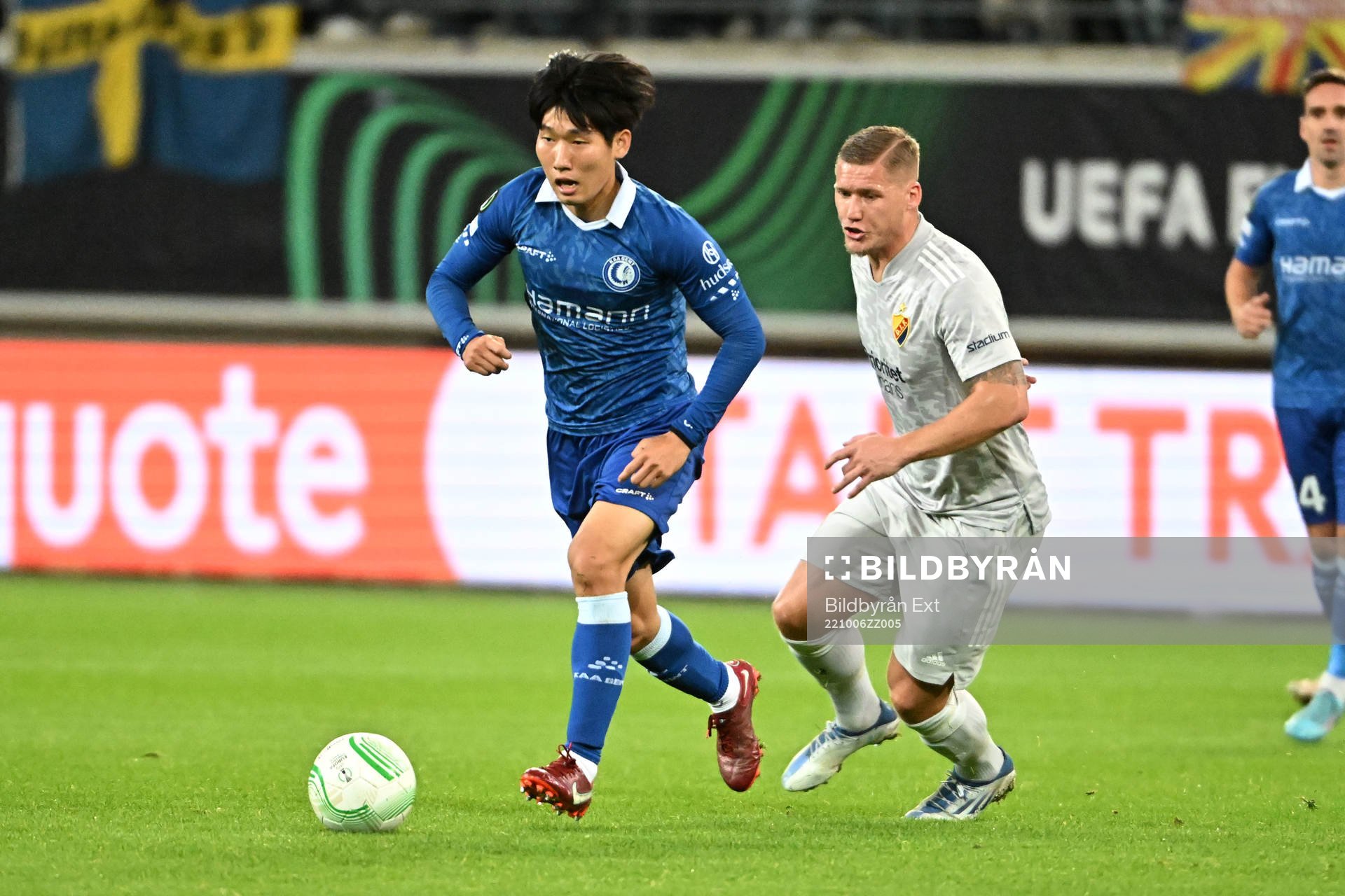 Hyunseok Hong of Gent battles and Victor Edvardsen of