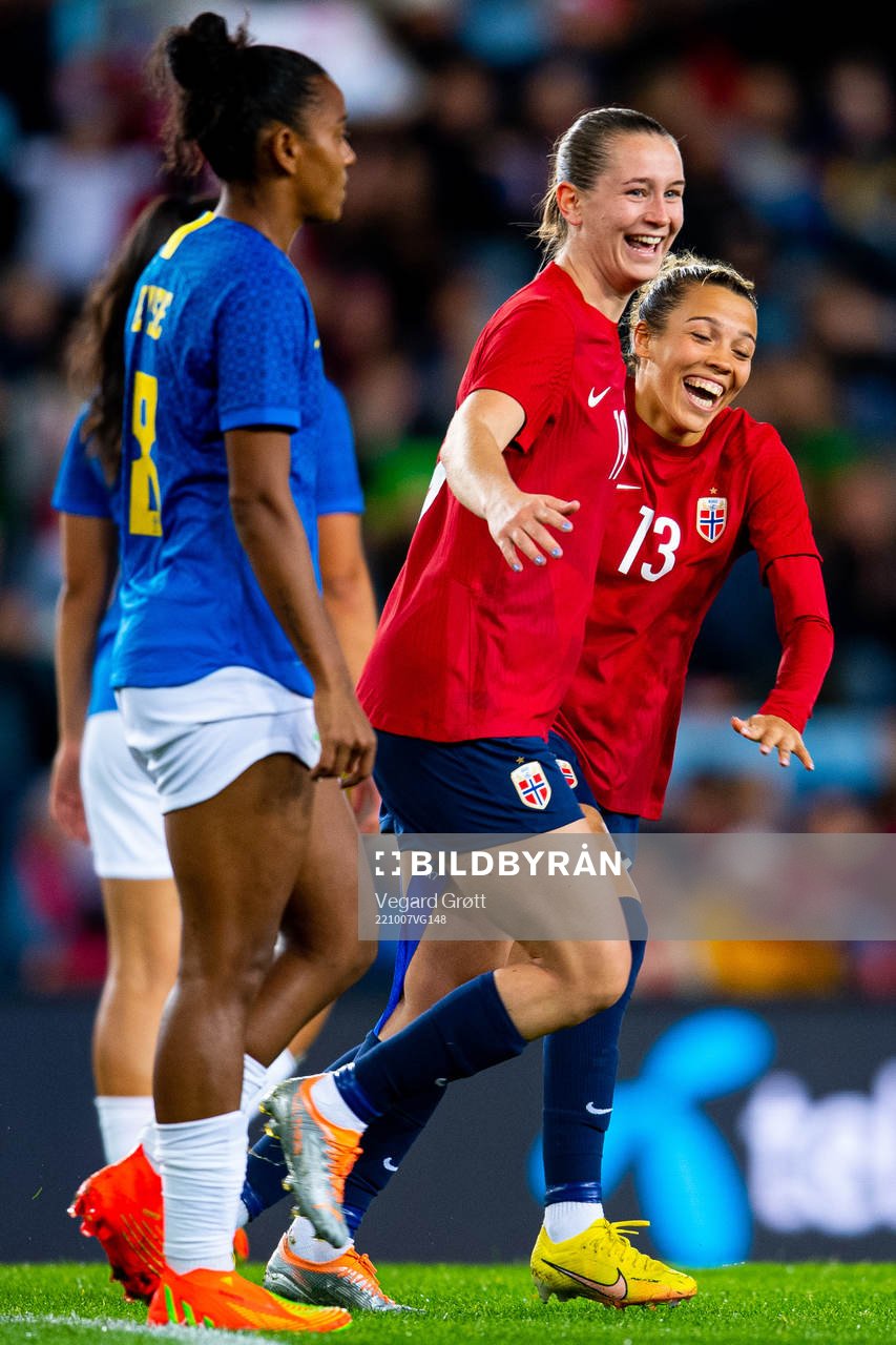 Celin Bizet Ildhusøy of Norway celebrates with teammate